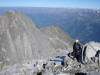 Marco Geronimi arriva in cima al Pizzo Cengalo 3367 m, con un cliente.