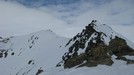 La cima alpinistica del Piz  Cotschen 3030 mt sx vista dall'anticima sciistica 2973 mt.