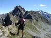 Gianluca durante la discesa dal Pizzo del Salto 2665 m con il Pizzo di Grò 2653 m.