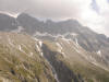 In lontananza (innevato) il Passo Porcellizzo.