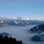 Gli unici momenti di sole si sono visti alla partenza. Da notare il lago di nuvole che ricopre tutta la Valtellina.