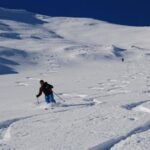 Lorenzo in discesa dal monte Sossino su neve  superlativa.